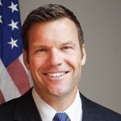 Kris Kobach (R)